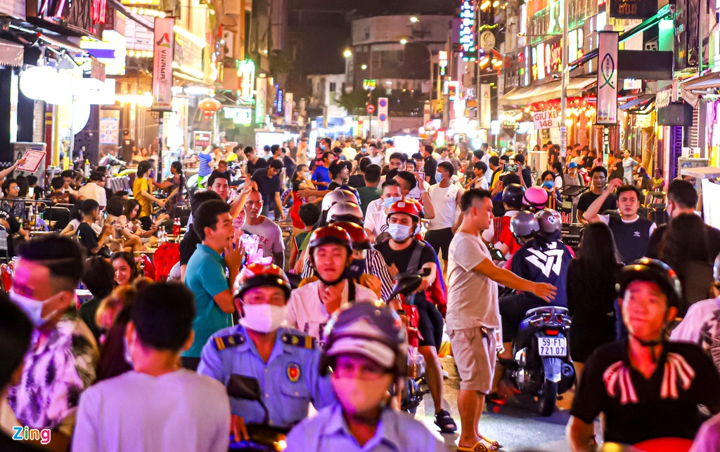 in photos saigon backpacker street bustling again after months of closing due to covid 19